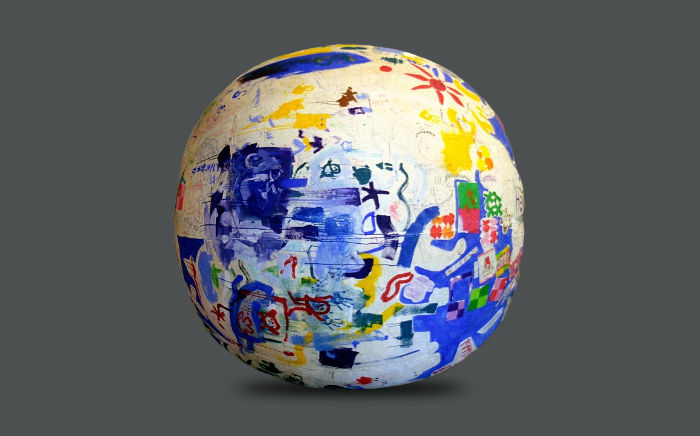 Image of 'Innocent Globe' — a large inflatable and painted ball — an artwork by Arunkumar H.G.