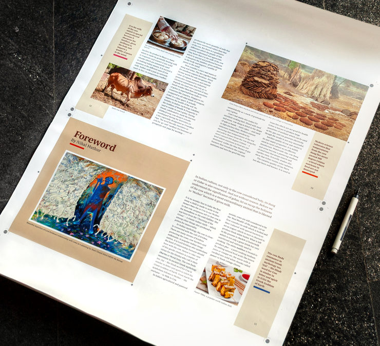 A large sheet of paper with the printed layout and printing marks on all sides