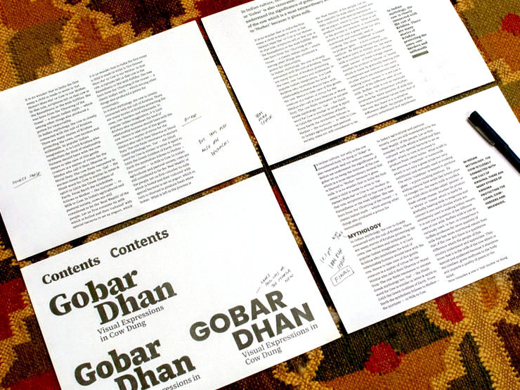 Four printouts with text and book names on them, in different fonts