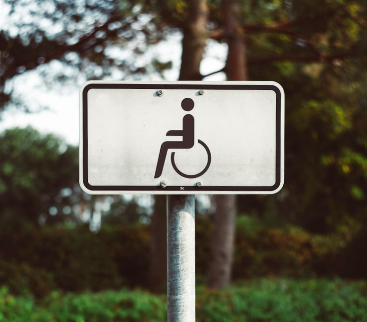 Wheelchair icon on a signage in a park