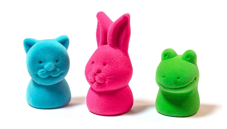 Studio photograph of Rubbabu toys: a cat, a bunny and a frog