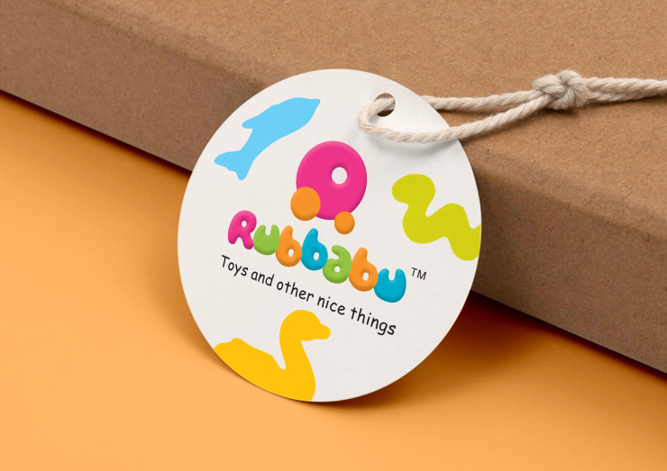 The logo and colourful graphics on a round tag adjacent to a cardboard box