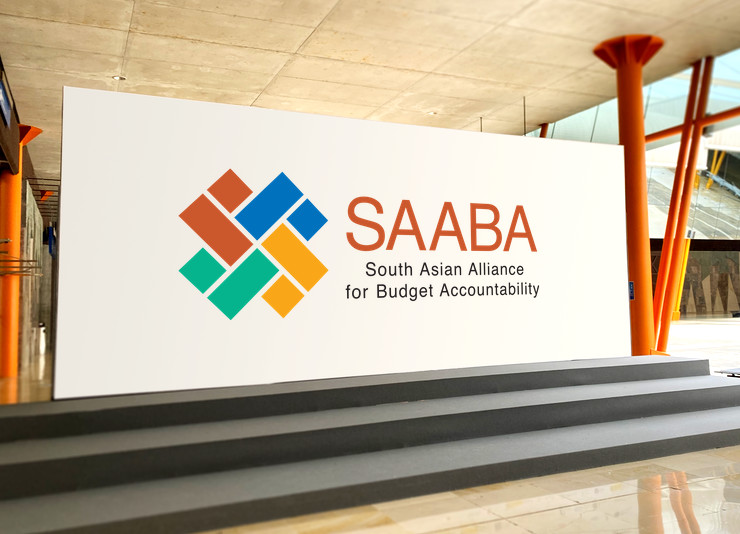 SAABA logo printed on a large white canvas placed behind a stage