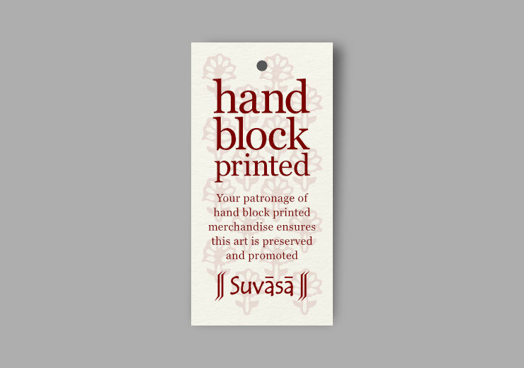 ‘Hand Block Printed’ in large font, some text and Suvasa logo below, over a faint floral pattern
