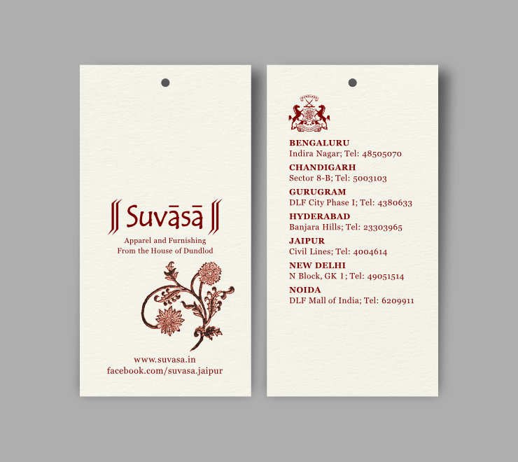 Tag layouts dominated by the Suvasa logo and a floral motif, with all elements in maroon colour