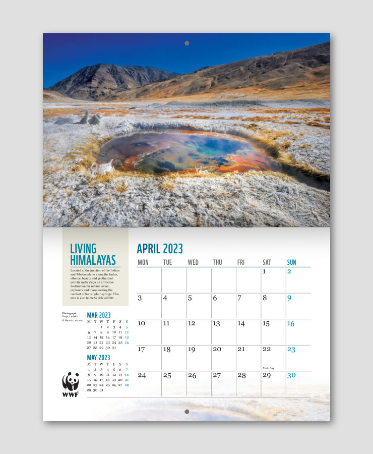 Calendar layout featuring a photograph of a high altitude hot spring