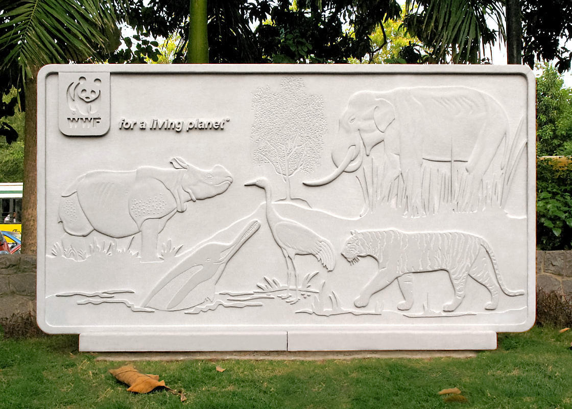 Front view of the stone mural showing five priority / threatened Indian mammal and bird species