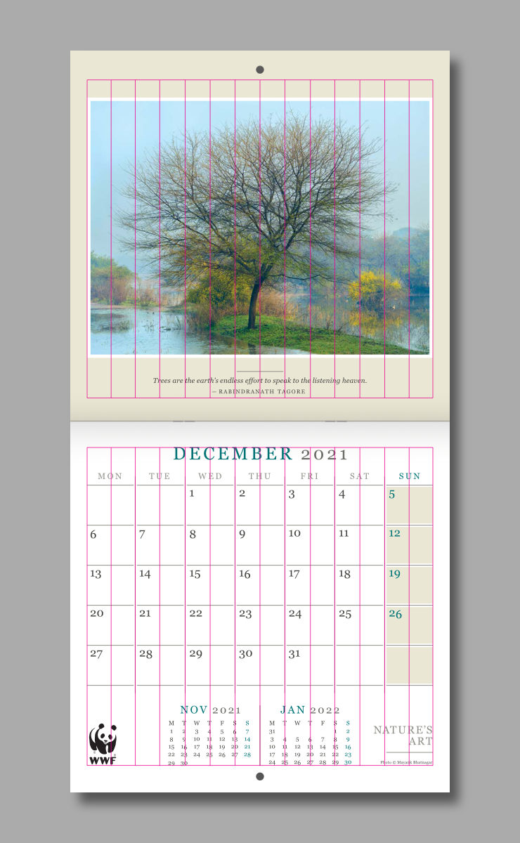 Grid overlaid on December spread of the calendar featuring a photograph of a large tree